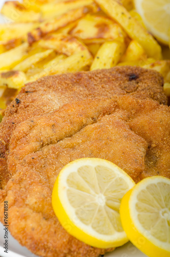 Big Chicken schnitzel with homemade chilli french fries