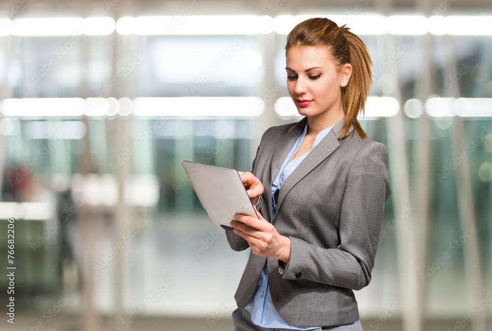 Businesswoman using a tablet Businesswoman using a tablet