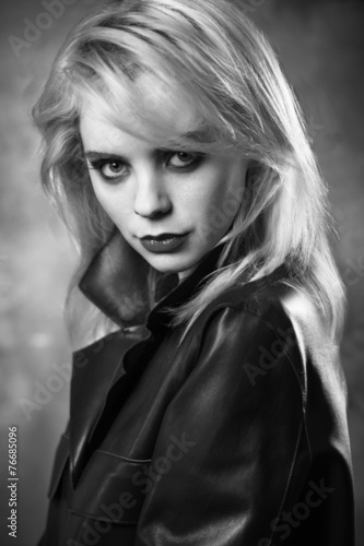 monochrome portrait of a beautiful woman in a coat