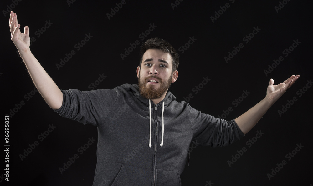 Surprise Man in Gray Jacket with Arms Open Surprise Man in Gray Jacket with Arms Open