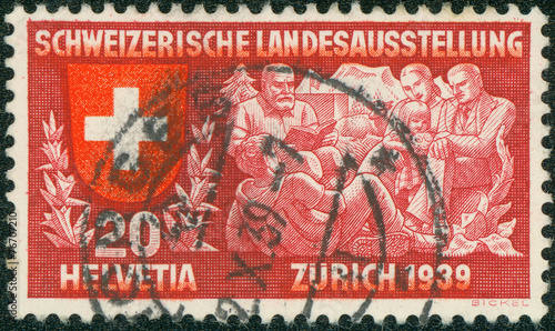 stamp printed in Switzerland shows coat of arms of confederation