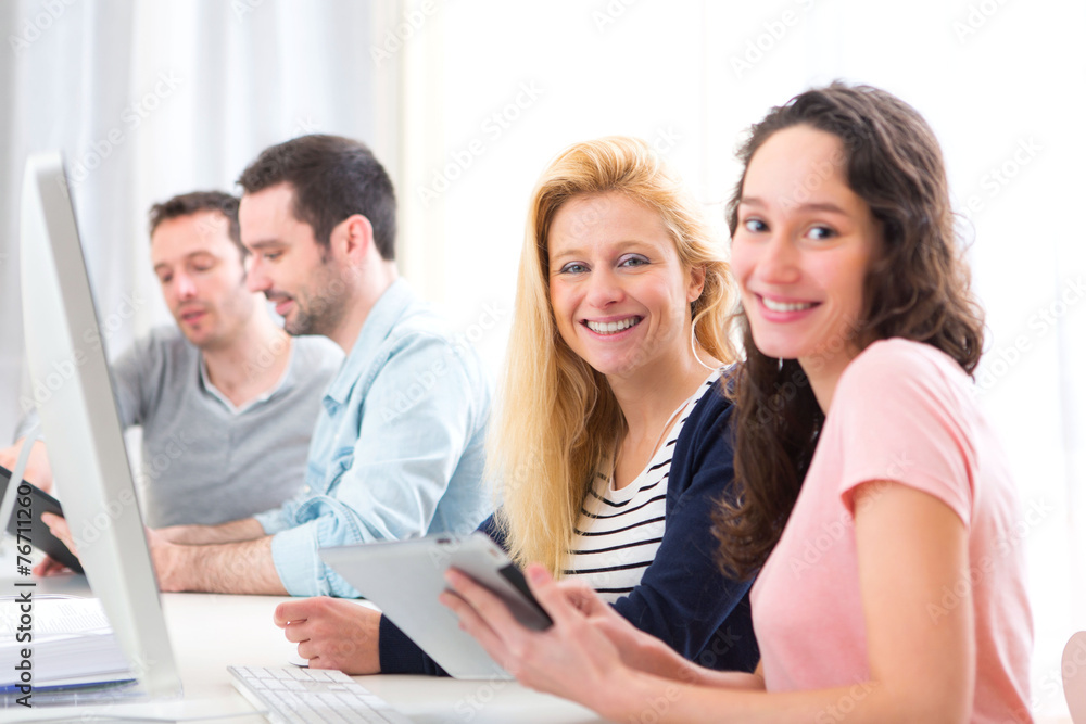 Young attractive people working together at the office Young attractive people working together at the office