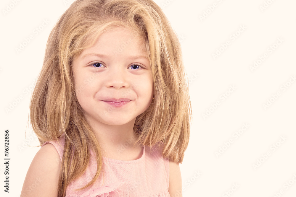 Closeup portrait of a cute liitle girl smiling Closeup portrait of a cute liitle girl smiling