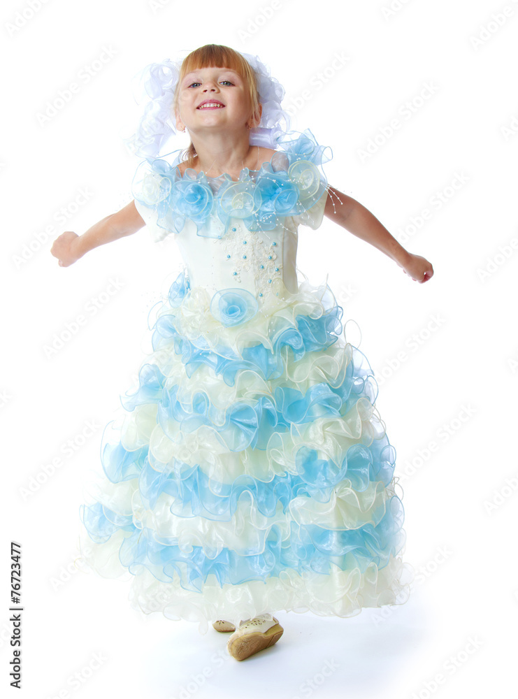 Charming little princess in a long dress. Charming little princess in a long dress.