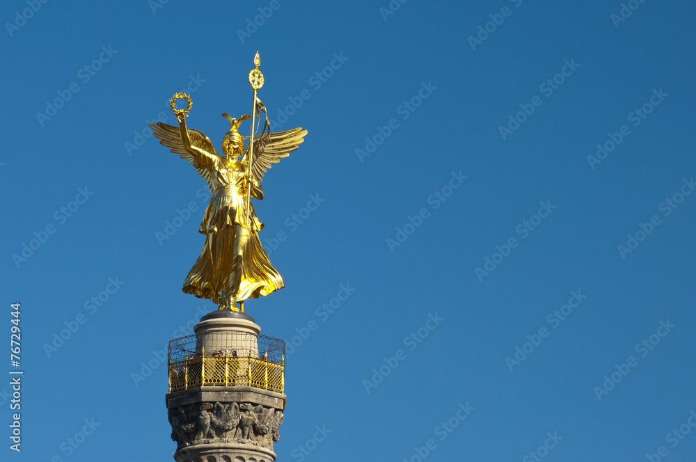 golden bronze sculpture on the Victory Column, Berlin, Germany golden bronze sculpture on the Victory Column, Berlin, Germany