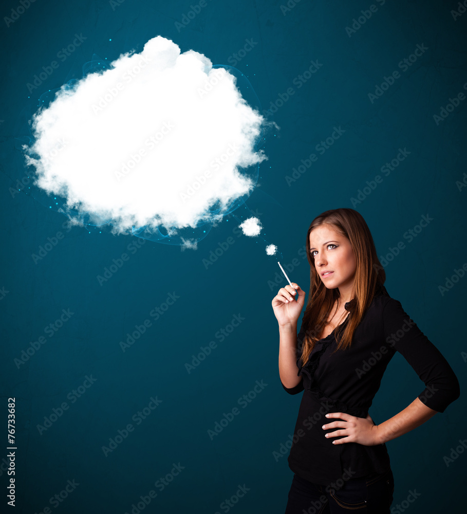 Fototapeta premium Young woman smoking unhealthy cigarette with dense smoke