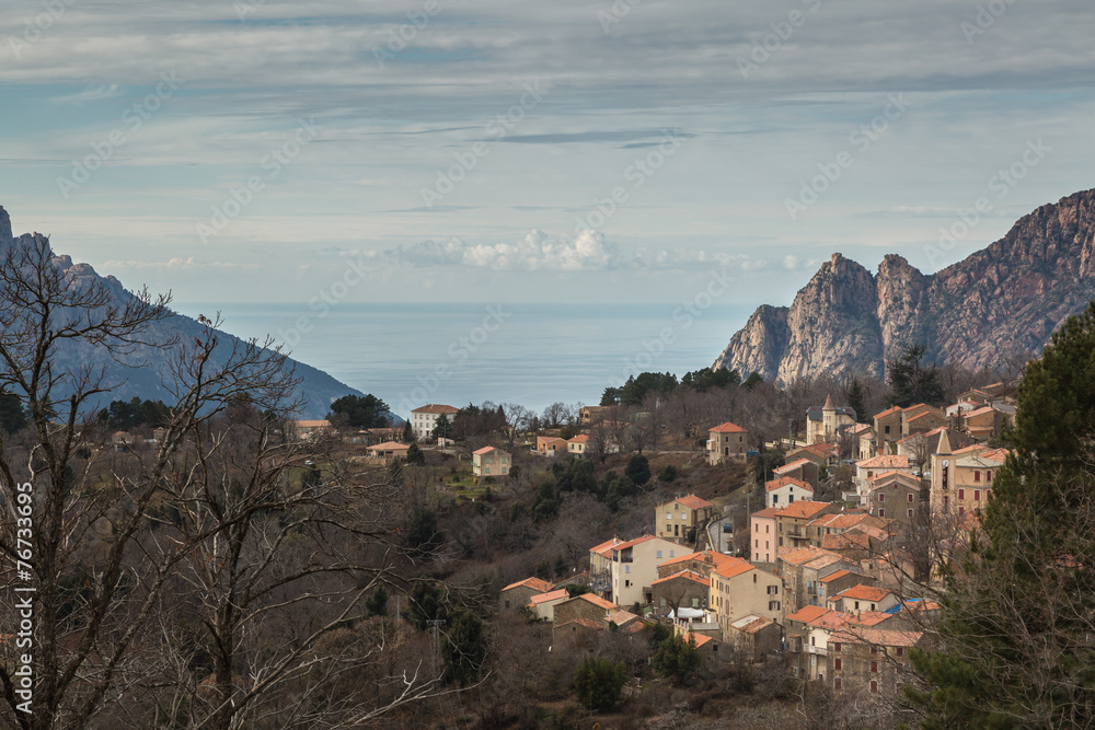 Evisa in Corsica with mountains and sea behind