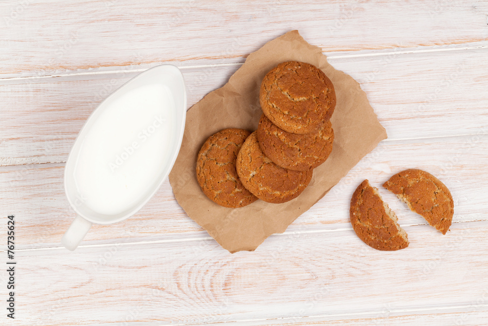 Milk pitcher and gingerbread cookies