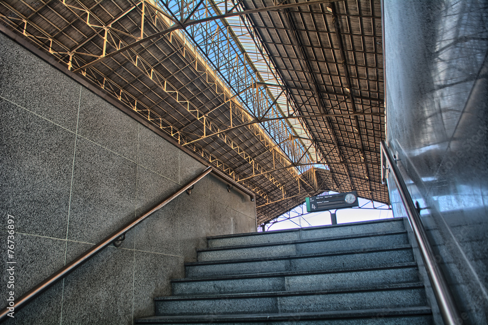 Fototapeta premium Stairs of a train station platform in