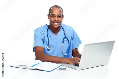 Medical doctor working with computer.
