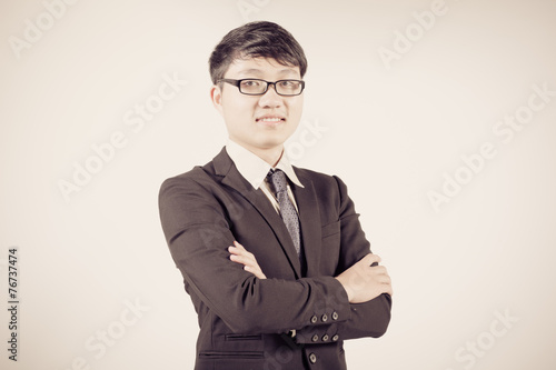 Successful young business man of Asian, full length portrait iso