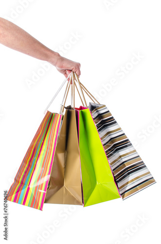 Arm carrying shopping bags