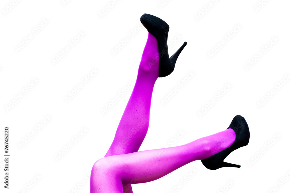 Female legs in pink pantyhose and black high heels Female legs in pink pantyhose and black high heels