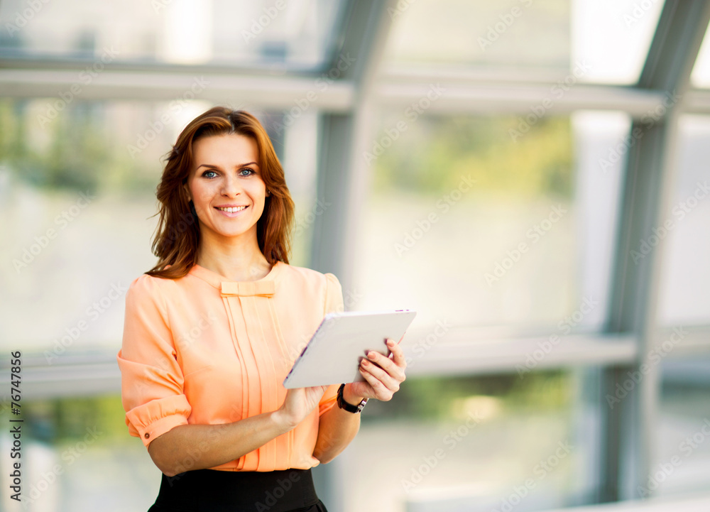 business woman holding digital tablet computer business woman holding digital tablet computer