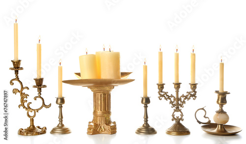 Φωτογραφία Retro candlesticks with candles, isolated on white