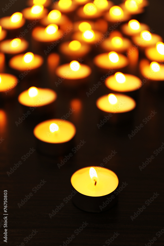 Burning candles on dark background Burning candles on dark background