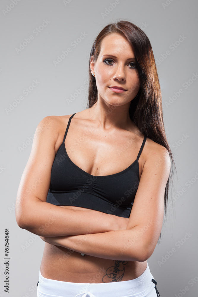 young attractive woman in sporty outfit young attractive woman in sporty outfit