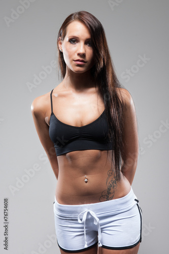 young attractive woman in sporty outfit © Brian Bailey