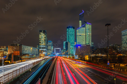Photography Night road with skyscrapers of La Defense, Paris, France.