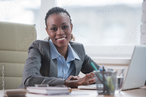 African businesswoman working with laptop