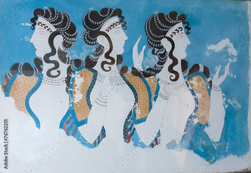 Aged fresco of three women profiles in Knossos