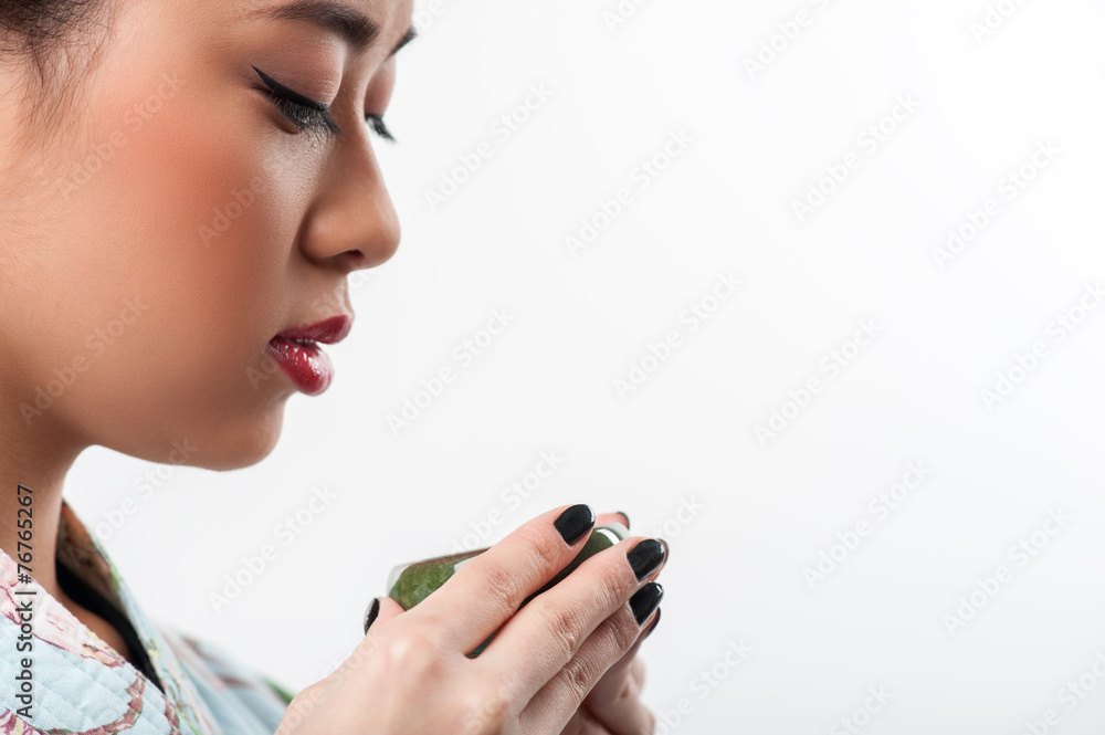 Tea ceremony conducted by Asian woman Tea ceremony conducted by Asian woman