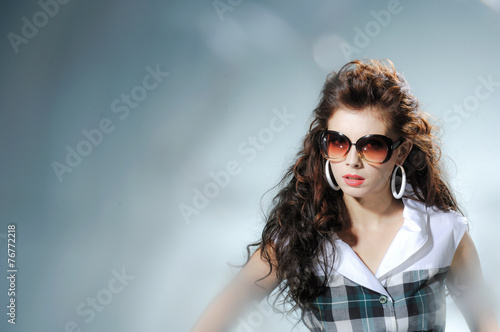 fashion shot of girl with sunglasses 
