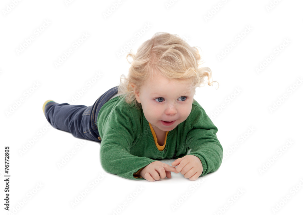 Adorable blond baby lying on the floor Adorable blond baby lying on the floor
