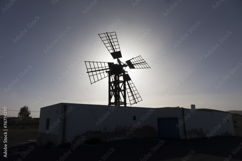 Back lit silouette of windmill in Lajares Fuerteventura Las Palm