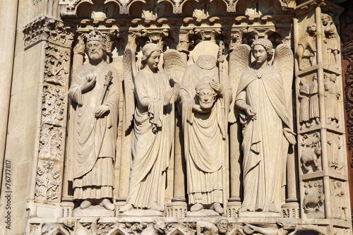 Statue of Saint Denis holding his head, Notre Dame cathedral
