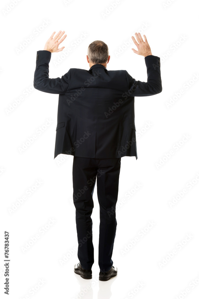 Businessman pressing abstract screen Businessman pressing abstract screen