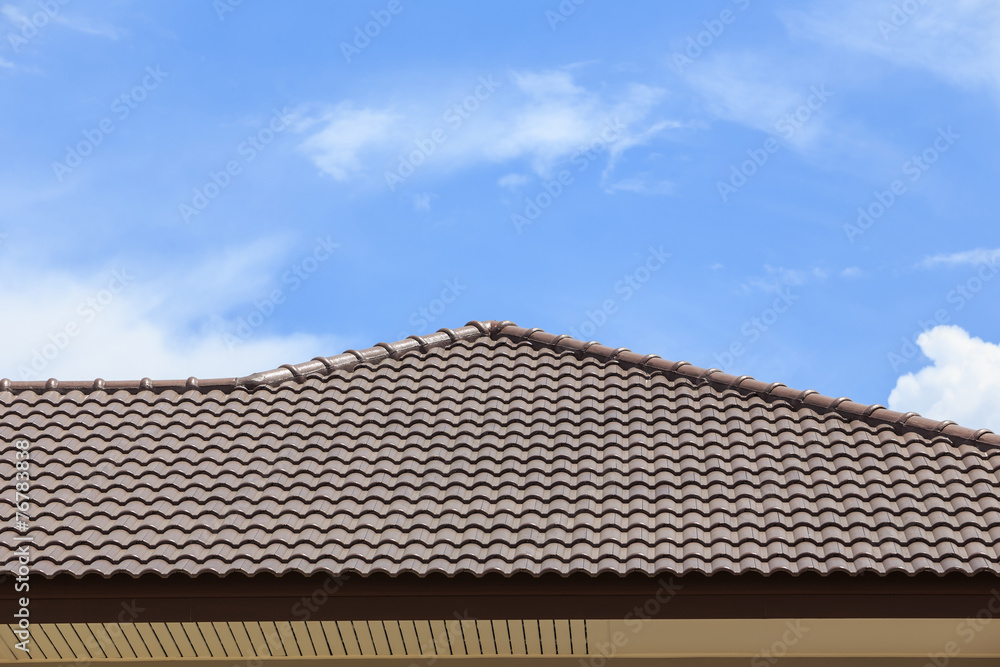 roof under construction with stacks of roof tiles for home build