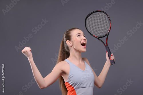 Tennis woman player with racket