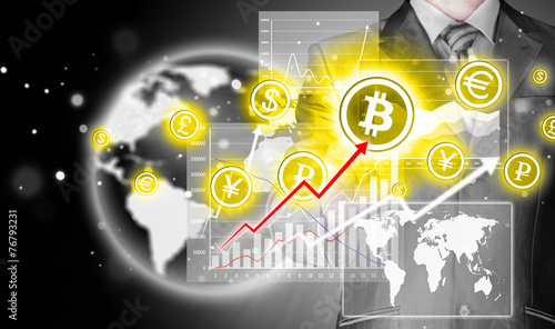 Choosing bitcoins, businessman pressing touch screen button.