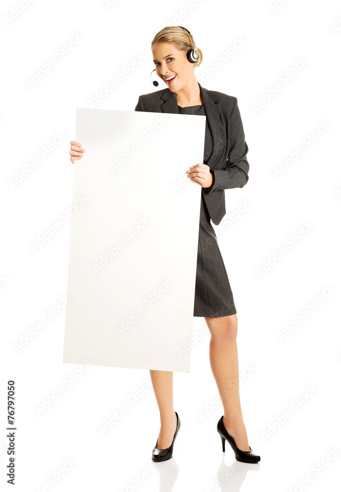 Call center woman holding empty blank Call center woman holding empty blank