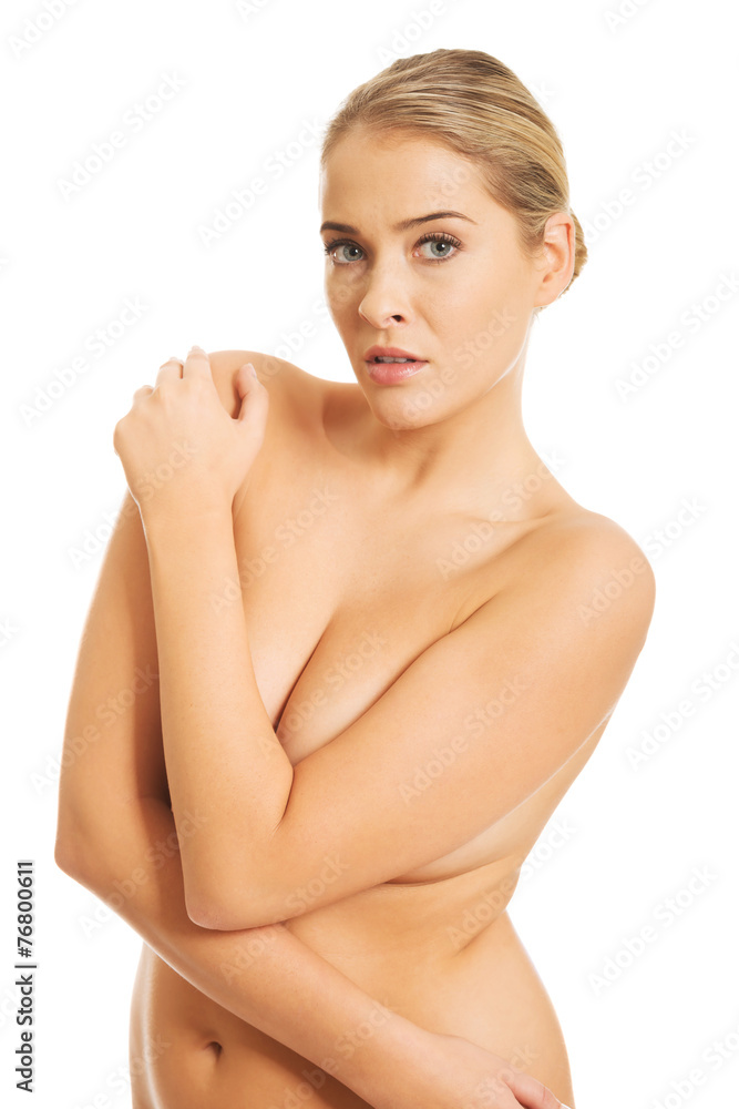 Topless woman looking at camera Topless woman looking at camera