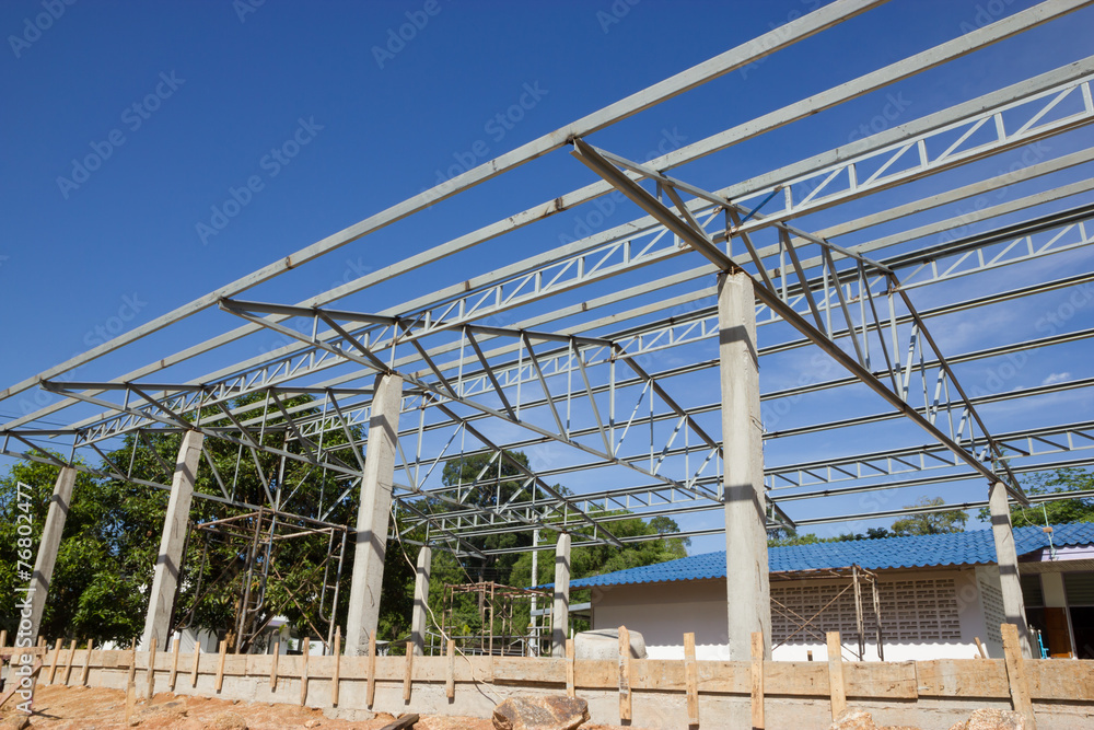 Metal roof construction and blue sky Metal roof construction and blue sky