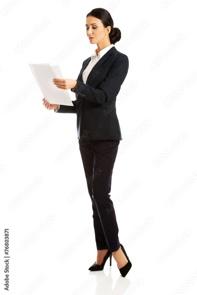 Businesswoman with paper notes Businesswoman with paper notes