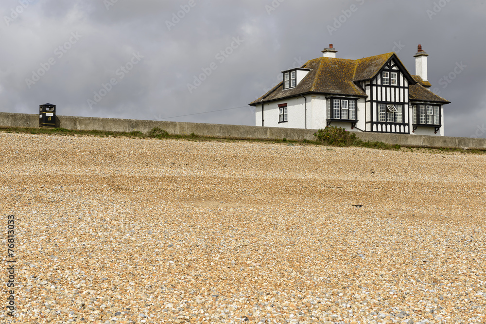 shingle beach and old cottage at New Romney
