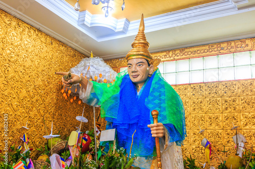 God at Bo Ta Tuang Paya temple in Yangon, Myanmar photo