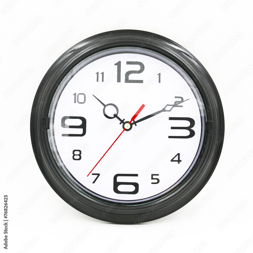 Black and white round wall clock isolated on white background. Black and white round wall clock isolated on white background.
