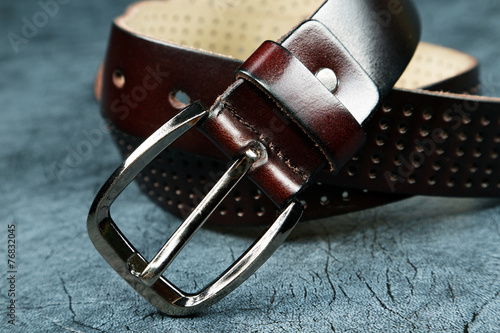 Female belt against from a leather