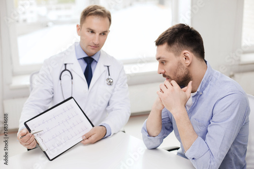 doctor with clipboard and patient in hospital