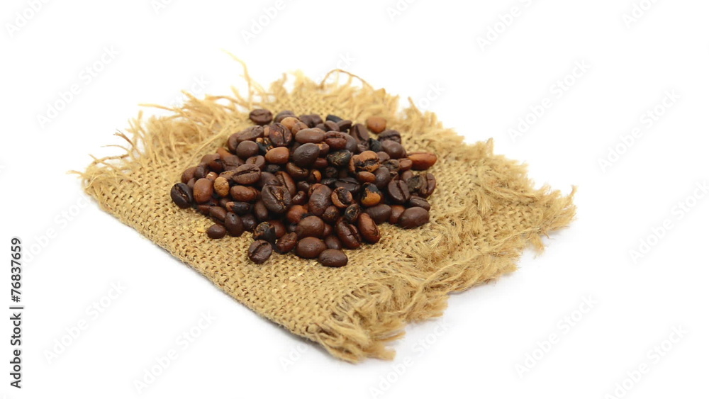 coffee beans on sack rotate on white background coffee beans on sack rotate on white background