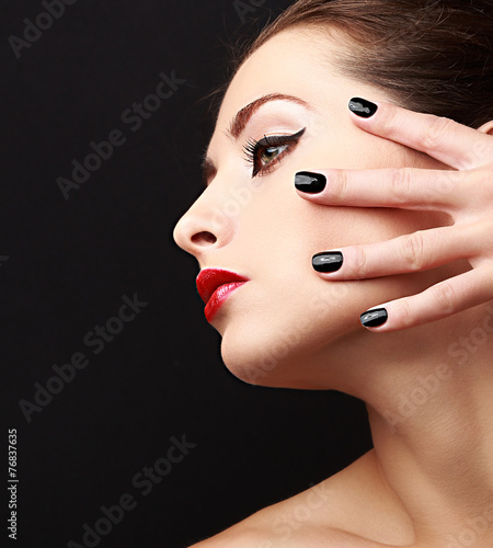Woman perfect makeup profile with black nails polish