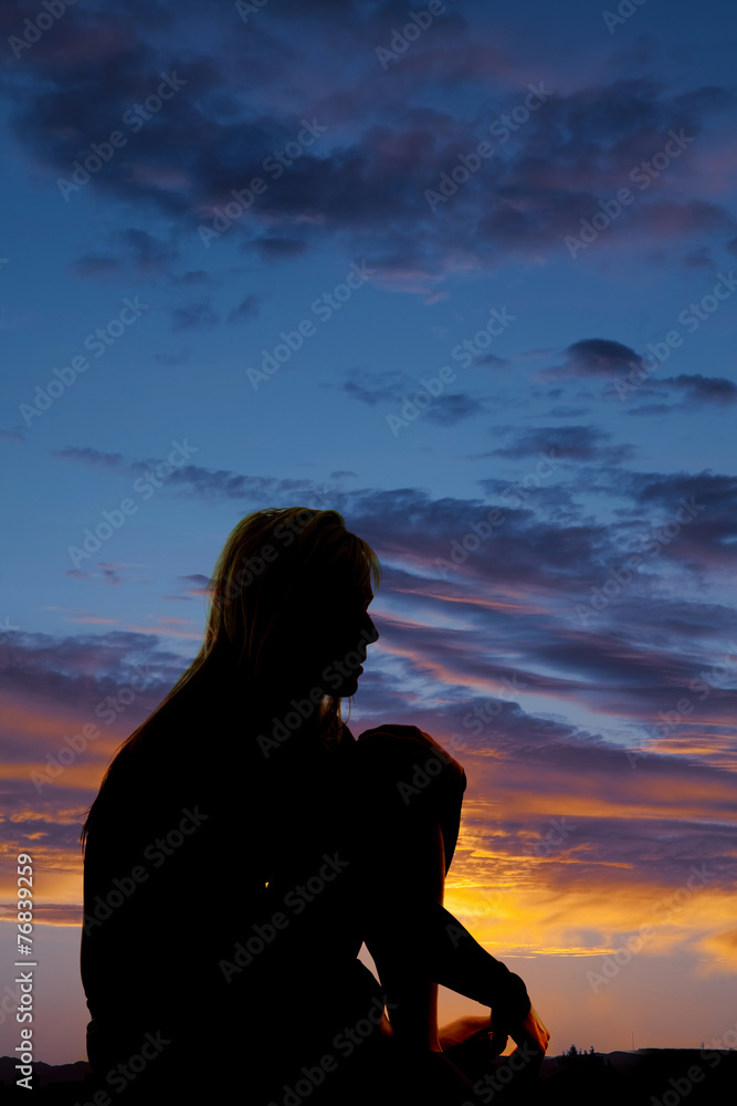 silhouette of a woman sitting tired silhouette of a woman sitting tired