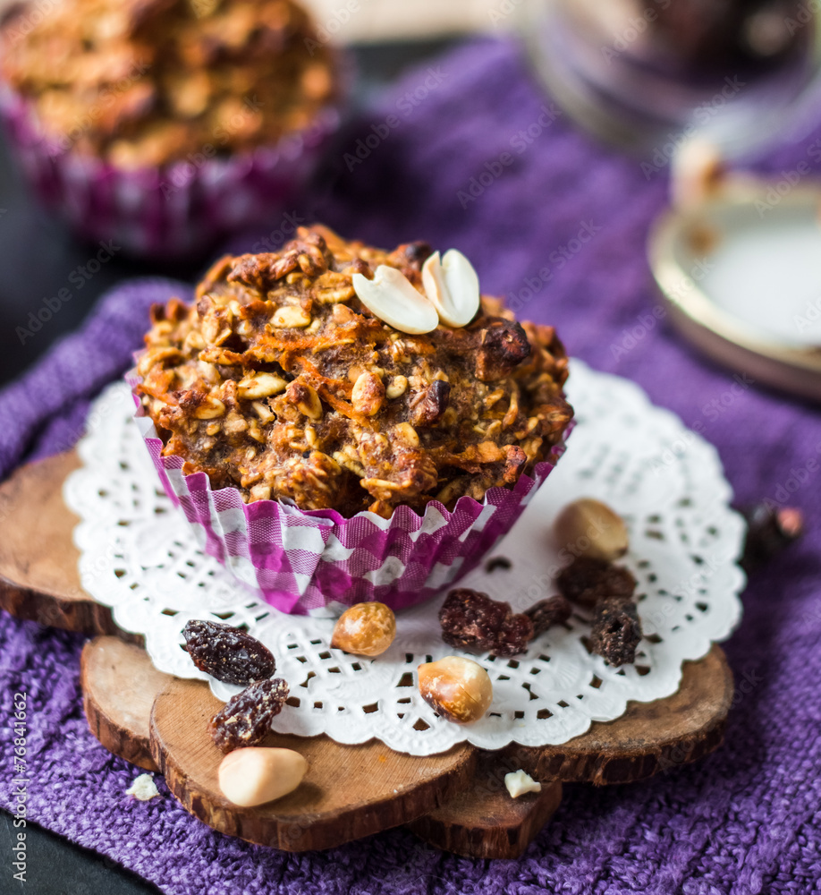 Fototapeta premium vegan muffins with oat flakes with raisins and nuts