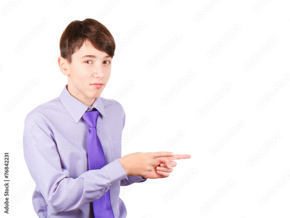 Teen boy in shirt and tie pointing copy space Teen boy in shirt and tie pointing copy space