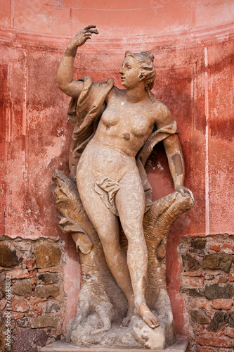 Stone statue of a woman in Dobris in Czech Republic photo