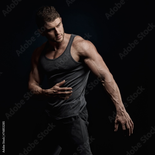 athletic young man portrait in studio